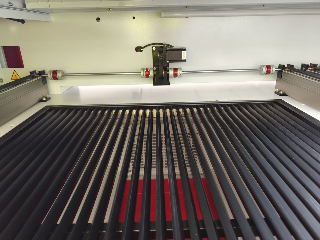 Co2 Laser Cutting Machine Designed with Dual Station Belt System to Optimize Cutting Operations and Material Utilization